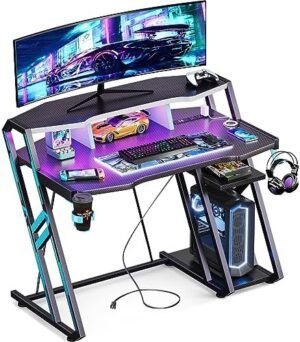 MOTPK Gaming Desk with Power Outlet & LED Lights, Gaming Computer Desk 39inch with PC Storage Shelf, Gaming Table with Carbon Fiber Texture, Gamer Desk, Gift for Boys Men, Black